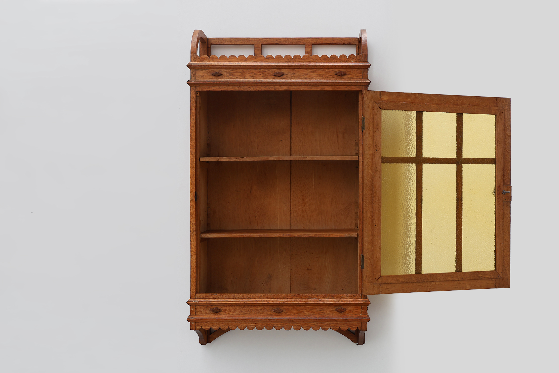 Art Deco oak wall cabinet with amber glazed door, Belgium ca. 1925thumbnail